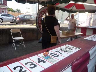 Ernie trying to win $$ on the money wheel